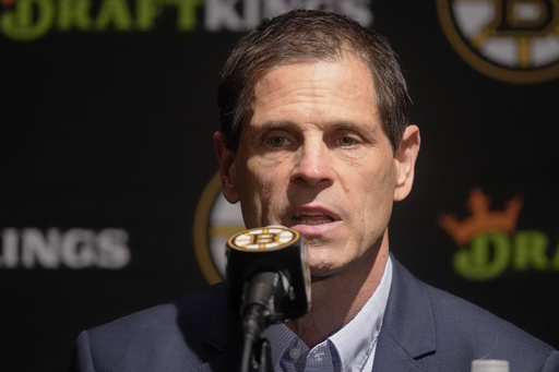 FILE - Boston Bruins general manager Don Sweeney answers a reporter's question, Monday, Sept. 30, 2024, in Boston. (AP Photo/Charles Krupa, File)
