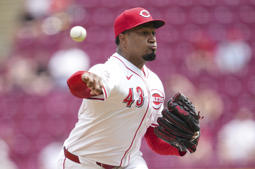 Cincinnati Reds pitcher Alexis Díaz throws during the ninth inning of the first baseball game of a doubleheader against the St. Louis Cardinals, Wednesday, April 30, 2025, in Cincinnati. (AP Photo/Jeff Dean)