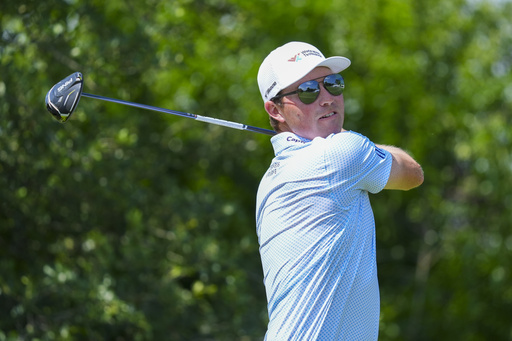Ben Griffin hits off the ninth tee on the during the first round of the Charles Schwab Challenge golf tournament at Colonial Country Club in Fort Worth, Texas, Thursday, May 22, 2025. (AP Photo/LM Otero)