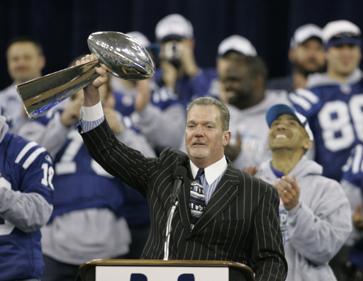 FILE - Indianapolis Colts owner Jim Irsay raises the Vince Lombardi trophy during a rally in Indianapolis, Monday, Feb. 5, 2007. The Colts defeated the Chicago Bears to win Super Bowl XLI. (AP Photo/Darron Cummings, File)