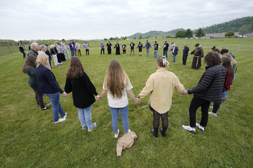 FILE - Capital punishment protesters pray on the grounds of Riverbend Maximum Security Institution before the scheduled execution of inmate Oscar Smith, April 21, 2022, in Nashville, Tenn. AP Photo/Mark Humphrey, File)