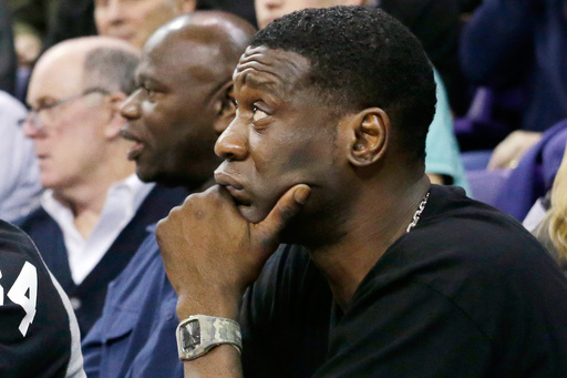 Former NBA star Shawn Kemp watches during the first half of an NCAA college basketball game Thursday, Jan. 15, 2015, in Seattle. (AP Photo/Elaine Thompson, File)