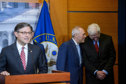 House Majority Leader Steve Scalise, R-La., center, and House Majority Whip Tom Emmer, R-Minn., right, talk as Speaker of the House Mike Johnson, R-La., left, speaks during a news conference at the Capitol, Tuesday, May 20, 2025, in Washington. (AP Photo/Rod Lamkey, Jr.)