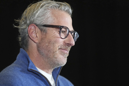 Casey Wasserman, chairman of LA 2028, the organizing committee for the 2028 Summer Olympics, is interviewed at an NBCUniversal and U.S. Olympic & Paralympic Committee press preview event to promote the upcoming Milano Cortina 2026 Olympic and Paralympic Winter Games, Wednesday, May 21, 2025, in Los Angeles. (AP Photo/Damian Dovarganes)