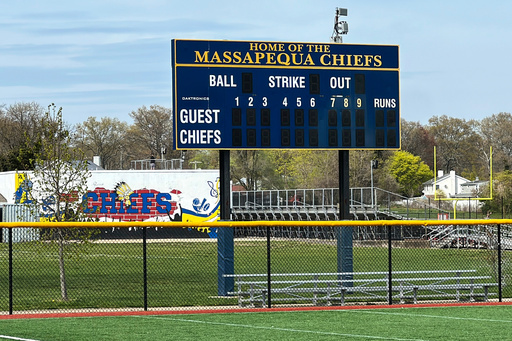 FILE - Chiefs signs and logos are displayed Massapequa High School in Massapequa, N.Y., Friday, April 25, 2025. (AP Photo/Ted Shaffrey, File)
