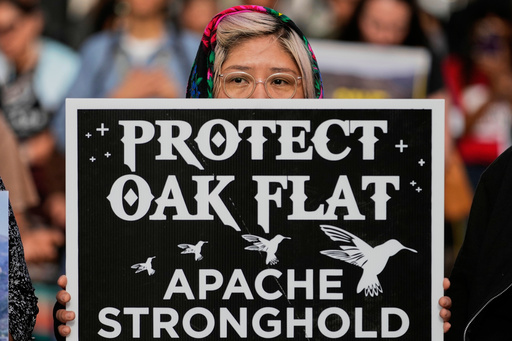 FILE - Members of Apache and others who want to halt a massive copper mining project on federal land in Arizona gather outside the U.S. District Court, May 7, 2025, in Phoenix. (AP Photo/Matt York, File)