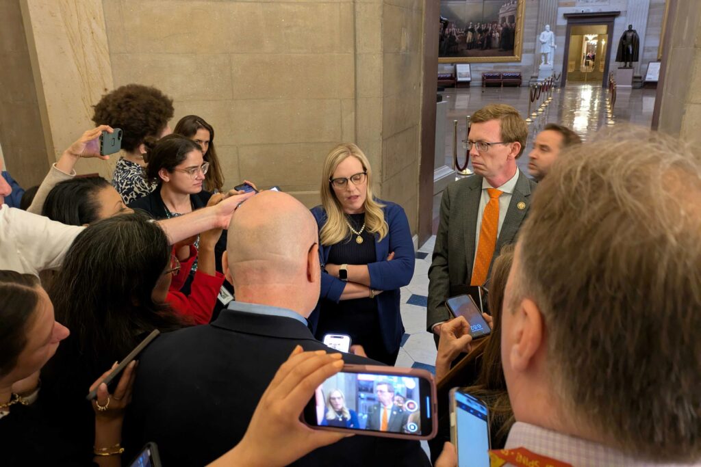 U.S. Reps. Erin Houchin, R-Indiana, left, and Dusty Johnson, R-South Dakota, speak to the media during negotiations on a budget reconciliation bill on May 21, 2025, in Washington, D.C. (Ashley Murray/States Newsroom)