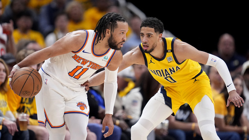 FILE - New York Knicks guard Jalen Brunson (11) drives past Indiana Pacers guard Tyrese Haliburton (0) during the second half of Game 3 in an NBA basketball second-round playoff series, Friday, May 10, 2024, in Indianapolis. (AP Photo/Michael Conroy, File)