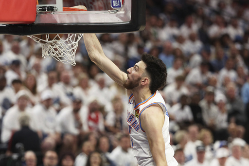 Oklahoma City Thunder forward Chet Holmgren dunks against the Minnesota Timberwolves during the second half of Game 4 of the Western Conference finals of the NBA basketball playoffs Monday, May 26, 2025, in Minneapolis. (AP Photo/Matt Krohn)