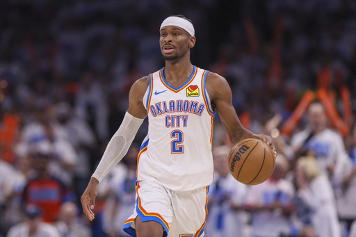 Oklahoma City Thunder guard Shai Gilgeous-Alexander dribbles the ball up court against Minnesota Timberwolves during the second half of Game 1 of an NBA basketball Western Conference Finals playoff series Tuesday, May 20, 2025, in Oklahoma City. (AP Photo/Nate Billings)