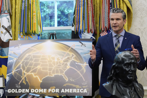 Defense Secretary Pete Hegseth speaks during an event with President Donald Trump in the Oval Office of the White House, Tuesday, May 20, 2025, in Washington. (AP Photo/Alex Brandon)