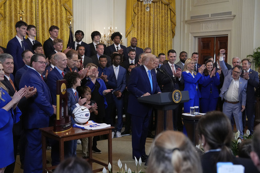 President Donald Trump speaks as he hosts the 2025 NCAA Champion, University of Florida men's basketball team in the East Room of the White House, Wednesday, May 21, 2025, in Washington. (AP Photo/Julia Demaree Nikhinson)