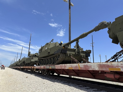 Tanks are loaded for transport at Fort Cavazos, near Killeen, Texas, Wednesday, May 21, 2025. (AP Photo/Jim Vertuno)
