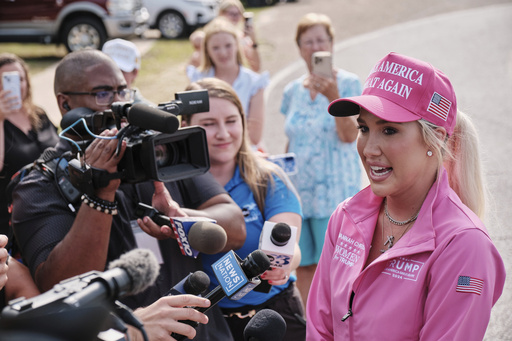 Savannah Chrisley, daughter of reality television star Todd Chrisley, speaks outside the Federal Prison Camp, Wednesday, May 28, 2025, in Pensacola, Fla. (AP Photo/Dan Anderson)