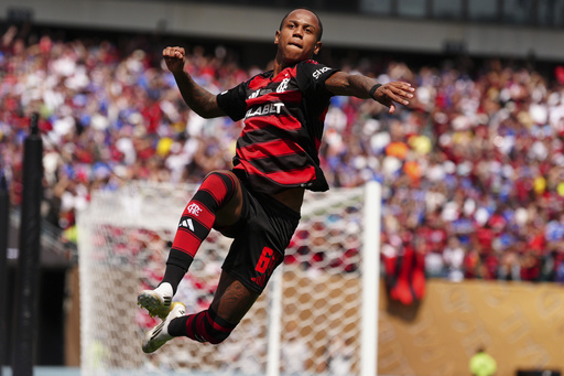 Flamengo's Wallace Yan celebrates after scoring during the Club World Cup Group D soccer match between Flamengo and Chelsea in Philadelphia, Friday, June 20, 2025. (AP Photo/Derik Hamilton)