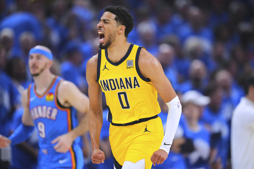 Indiana Pacers guard Tyrese Haliburton reacts after scoring during the first half of Game 7 of the NBA Finals basketball series against the Oklahoma City Thunder Sunday, June 22, 2025, in Oklahoma City. (AP Photo/Julio Cortez)