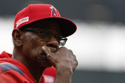 Los Angeles Angels manager Ron Washington looks on from the dugout during a baseball game against the Baltimore Orioles in Baltimore, Saturday, June 14, 2025. (AP Photo/Terrance Williams)