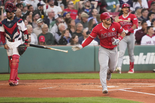 Los Angeles Angels designated hitter Mike Trout (27) watches his home run during the first inning of a baseball game against the Boston Red Sox, Monday, June 2, 2025, in Boston. (AP Photo/Robert F. Bukaty)