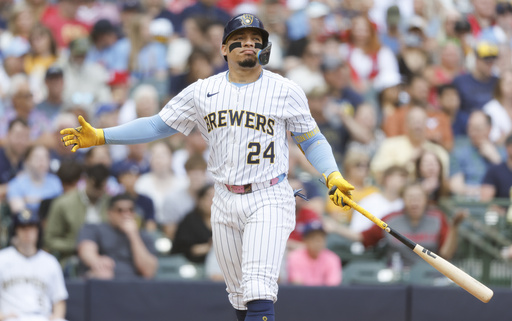 Milwaukee Brewers' William Contreras reacts after striking out against the St. Louis Cardinals during the fourth inning of a baseball game, Saturday, June, 14, 2025, in Milwaukee. (AP Photo/Jeffrey Phelps)