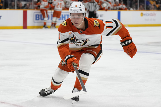 FILE - Anaheim Ducks center Trevor Zegras (11) plays during the first period of an NHL hockey game against the Nashville Predators, Thursday, March 20, 2025, in Nashville, Tenn. (AP Photo/George Walker IV, file)