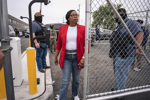 FILE - Congresswoman Rep. LaMonica McIver, D-N.J., exits the grounds at Delaney Hall, an ICE detention facility, May 9, 2025, in Newark, N.J, (AP Photo/Angelina Katsanis, File)