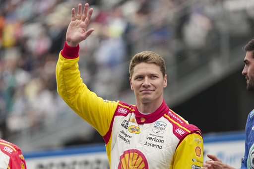 Josef Newgarden is introduced before the start of the Indianapolis 500 auto race at Indianapolis Motor Speedway in Indianapolis, Sunday, May 25, 2025. (AP Photo/AJ Mast)