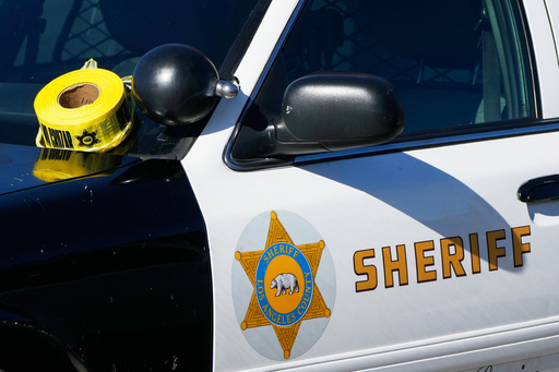 FILE - A roll of police tape is left on the windshield of a Los Angeles County sheriff's vehicle in the parking lot of its training academy in Whittier, Calif., Nov. 16, 2022. (AP Photo/Jae C. Hong, File)