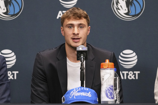 Dallas Mavericks' Cooper Flagg, the No. 1 overall pick in the NBA draft, speaks during an NBA basketball press conference at the team's practice facility, Friday, June 27, 2025, in Dallas. (AP Photo/Tony Gutierrez)