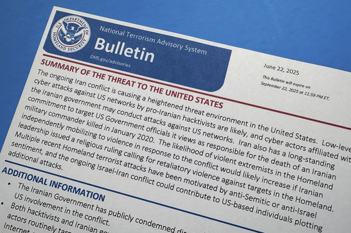 A National Terrorism Advisory System bulletin issued by the Department of Homeland Security warning of a "heightened threat environment" following U.S. strikes on Iranian nuclear sites, is photographed June 23, 2025. (AP Photo/Jon Elswick)