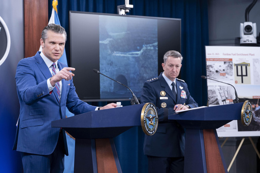 Defense Secretary Pete Hegseth, left, speaks at a news conference with Joint Chiefs Chairman Gen. Dan Caine at the Pentagon, Thursday, June 26, 2025 in Washington. (AP Photo/Kevin Wolf)