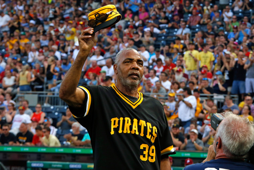FILE - Dave Parker, a member of the 1979 Pittsburgh Pirates World Championship team, tips his cap during a pre-game ceremony honoring the team before a baseball game between the Pittsburgh Pirates and the Philadelphia Phillies in Pittsburgh, Saturday, July 20, 2019. (AP Photo/Gene J. Puskar, File)