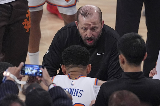 New York Knicks head coach Tom Thibodeau talks with players during a break in play against the Indiana Pacers during the first quarter of Game 5 of the NBA basketball Eastern Conference final, Thursday, May 29, 2025, in New York. (AP Photo/Frank Franklin II)