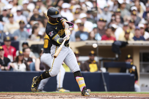 Pittsburgh Pirates' Andrew McCutchen hits a two-run home run against the San Diego Padres in the third inning of a baseball game Sunday, June 1, 2025, in San Diego. (AP Photo/Derrick Tuskan)