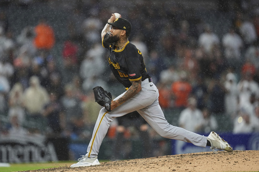Pittsburgh Pirates pitcher Dennis Santana throws against the Detroit Tigers in the ninth inning during the second baseball game of a doubleheader, Thursday, June 19, 2025, in Detroit. (AP Photo/Paul Sancya)