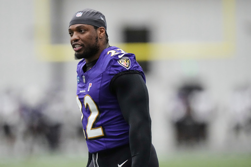 FILE - Baltimore Ravens running back Derrick Henry (22) works out during an NFL football practice, May 28, 2025, at the Under Armour Performance Center in Owings Mills, Md. (AP Photo/Stephanie Scarbrough, File)