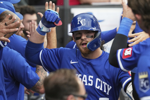 Kansas City Royals' Bobby Witt Jr. celebrates with teammates after hitting a two-run home run during the ninth inning of a baseball game against the Chicago White Sox in Chicago, Sunday, June 8, 2025. (AP Photo/Nam Y. Huh)