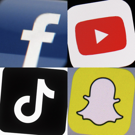 FILE - This combination of photos from 2017 to 2022 shows the logos of Facebook, YouTube, TikTok and Snapchat on mobile devices. (AP Photo, File)