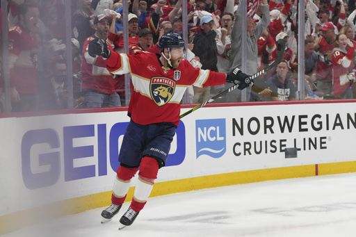 Florida Panthers center Sam Bennett (9) celebrates after scoring a goal during the second period of Game 3 of the NHL Stanley Cup final against the Edmonton Oilers Monday, June 9, 2025, in Sunrise, Fla. (AP Photo/Lynne Sladky)