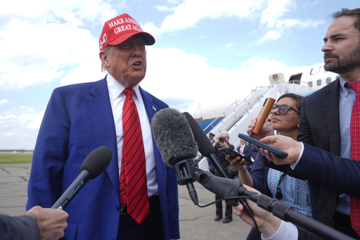 President Donald Trump speaks with reporters upon arriving at Morristown Municipal Airport in Morristown, N.J., Friday, June 20, 2025. (AP Photo/Manuel Balce Ceneta)