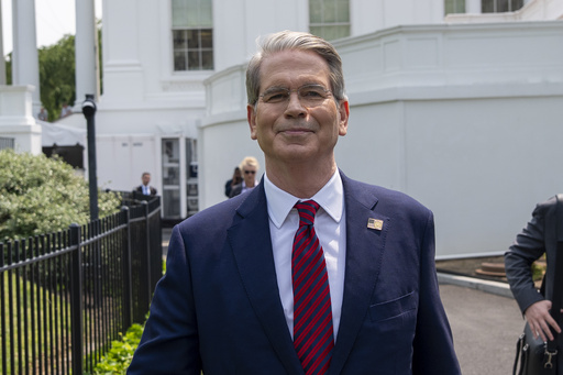 Treasury Secretary Scott Bessent walks at the White House, Tuesday, June 3, 2025, in Washington. (AP Photo/Alex Brandon)