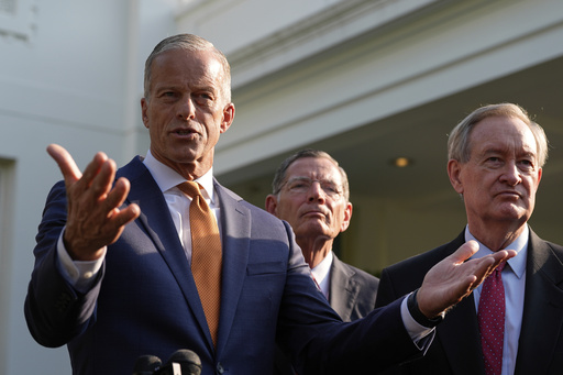 Senate Majority Leader John Thune, R-S.D., flanked by Sen. John Barrasso, R-Wyo., center, and Sen. Mike Crapo, R-Idaho, speak with reporters after meeting with President Donald Trump at the White House, Wednesday, June 4, 2025, in Washington. (AP Photo/Alex Brandon)