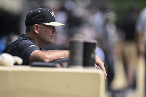 Wake Forest head coach Tom Walter looks on prior to an NCAA college baseball tournament super regional game against Alabama on June 11, 2023, in Winston-Salem, N.C. (AP Photo/Matt Kelley, file)