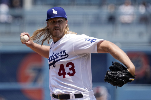 FILE - Los Angeles Dodgers starting pitcher Noah Syndergaard throws to the plate during the first inning of a baseball game against the St. Louis Cardinals Sunday, April 30, 2023, in Los Angeles. (AP Photo/Mark J. Terrill, File)