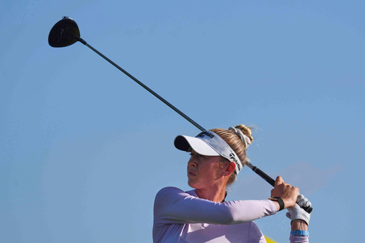 Nelly Korda hits a tee shot on the second hole during the first round of the Women's PGA Championship golf tournament, Thursday, June 19, 2025, in Frisco, Texas. (AP Photo/LM Otero)