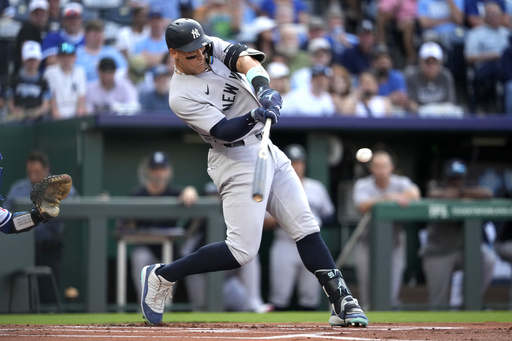 New York Yankees' Aaron Judge hits a two-run home run in the first inning during a baseball game against the Kansas City Royals, Tuesday, June 10, 2025, in Kansas City, Mo. (AP Photo/Ed Zurga)