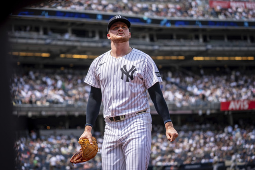 New York Yankees pitcher Clarke Schmidt (36) walks off the field during the fourth inning of a baseball game against the Athletics, Saturday, June 28, 2025, in New York. (AP Photo/Angelina Katsanis)