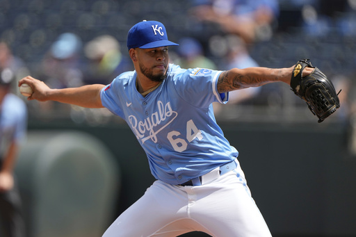 Kansas City Royals relief pitcher Steven Cruz throws during the seventh inning of a baseball game against the Atlanta Braves Wednesday, July 30, 2025, in Kansas City, Mo. (AP Photo/Charlie Riedel)