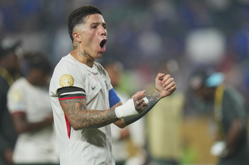 Chelsea's Enzo Fernandez reacts at the end of the Club World Cup quarterfinal soccer match between Palmeiras and Chelsea in Philadelphia, Friday, July 4, 2025. (AP Photo/Chris Szagola)