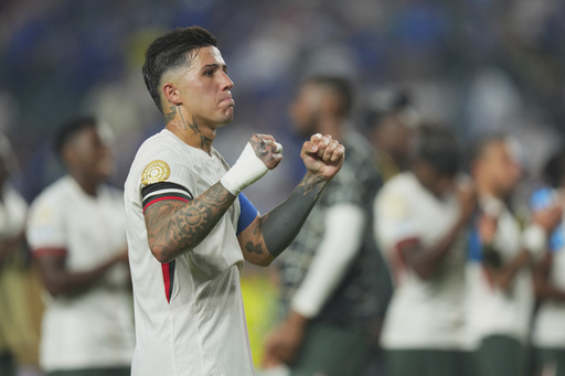Chelsea's Enzo Fernandez reacts at the end of the Club World Cup quarterfinal soccer match between Palmeiras and Chelsea in Philadelphia, Friday, July 4, 2025. (AP Photo/Chris Szagola)