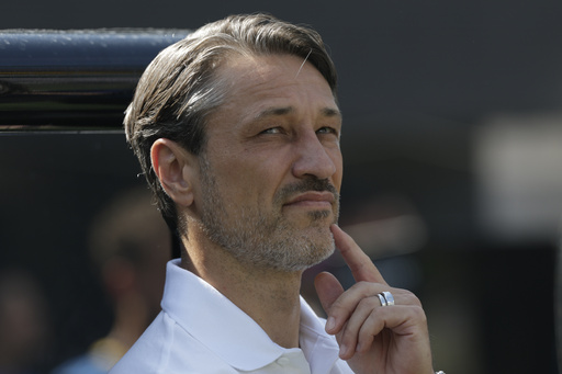 Borussia Dortmund's coach Niko Kovac waits for the beginning of the Club World Cup quarterfinal soccer match between Real Madrid and Borussia Dortmund in East Rutherford, N.J., Saturday, July 5, 2025. (AP Photo/Adam Hunger)